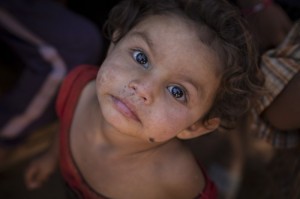 Rami*, two, at her home in a tented refugee settlement in Lebanon, near the Syrian border. *All names have been changed to protect identities. Photo Credit: Jonathan Hyams/Save the Children