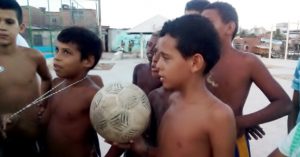 The kids in the favela in Recife talking about football