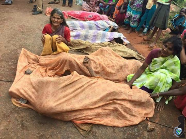 Dead bodies are covered as women mourn. Over 500 people have lost their lives in the Chennai Flood. 