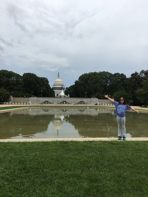 Cindy’s daughter in front of the United States Capitol building